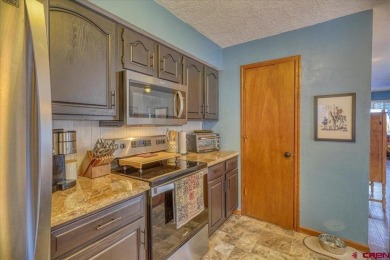MOTIVATED SELLER!! Fell out of contract by indecisive buyer, not on Pagosa Springs Golf Club in Colorado - for sale on GolfHomes.com, golf home, golf lot
