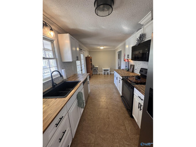 Gorgeous 4 bedroom home on a corner lot inside Arab city limits! on Twin Lakes Golf Course in Alabama - for sale on GolfHomes.com, golf home, golf lot