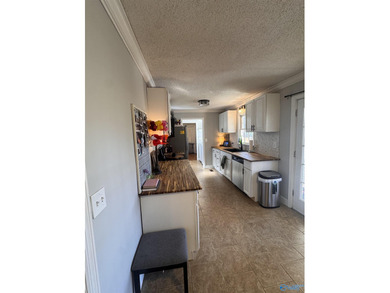 Gorgeous 4 bedroom home on a corner lot inside Arab city limits! on Twin Lakes Golf Course in Alabama - for sale on GolfHomes.com, golf home, golf lot