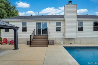 Step into this beautifully maintained 3 bed, 3 bath vaulted on Bear Creek Golf Club in Missouri - for sale on GolfHomes.com, golf home, golf lot