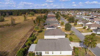 Start the new year in your dream home! Welcome to this stunning on Bella Glade Country Club in Florida - for sale on GolfHomes.com, golf home, golf lot