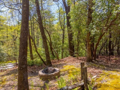 Tucked away in the heart of Sapphire Valley and just minutes on Sapphire National Golf Club in North Carolina - for sale on GolfHomes.com, golf home, golf lot