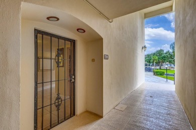 LIGHT AND SPACIOUS, FIRST FLOOR CORNER UNIT IN POPULAR 55+ on BallenIsles Golf and Country Club in Florida - for sale on GolfHomes.com, golf home, golf lot