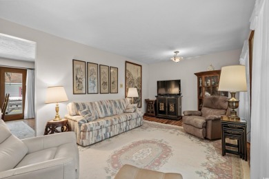 Welcome to this charming 4-bedroom, 3-bathroom all-brick ranch on Pine Lakes Country Club in South Carolina - for sale on GolfHomes.com, golf home, golf lot