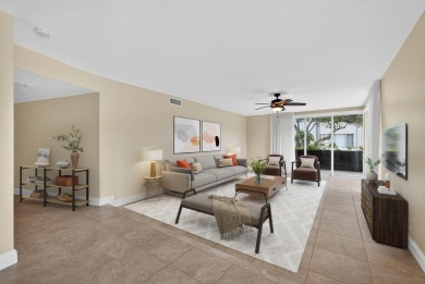 LIGHT AND SPACIOUS, FIRST FLOOR CORNER UNIT IN POPULAR 55+ on BallenIsles Golf and Country Club in Florida - for sale on GolfHomes.com, golf home, golf lot