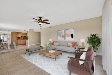 LIGHT AND SPACIOUS, FIRST FLOOR CORNER UNIT IN POPULAR 55+ on BallenIsles Golf and Country Club in Florida - for sale on GolfHomes.com, golf home, golf lot