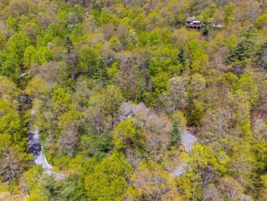 Tucked away in the heart of Sapphire Valley and just minutes on Sapphire National Golf Club in North Carolina - for sale on GolfHomes.com, golf home, golf lot