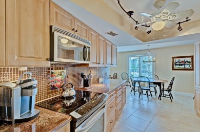 LIGHT AND SPACIOUS, FIRST FLOOR CORNER UNIT IN POPULAR 55+ on BallenIsles Golf and Country Club in Florida - for sale on GolfHomes.com, golf home, golf lot