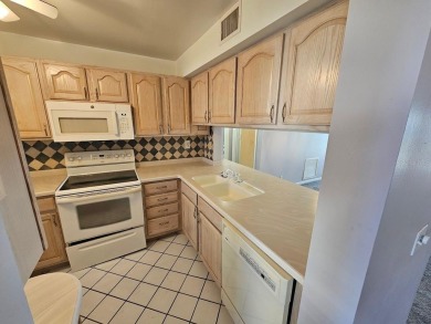 ** REDUCED PRICE ** Great water view from this 2nd floor villa on Isla Del Sol Yacht and Country Club in Florida - for sale on GolfHomes.com, golf home, golf lot