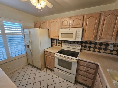 ** REDUCED PRICE ** Great water view from this 2nd floor villa on Isla Del Sol Yacht and Country Club in Florida - for sale on GolfHomes.com, golf home, golf lot