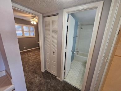 ** REDUCED PRICE ** Great water view from this 2nd floor villa on Isla Del Sol Yacht and Country Club in Florida - for sale on GolfHomes.com, golf home, golf lot
