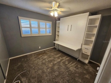 ** REDUCED PRICE ** Great water view from this 2nd floor villa on Isla Del Sol Yacht and Country Club in Florida - for sale on GolfHomes.com, golf home, golf lot