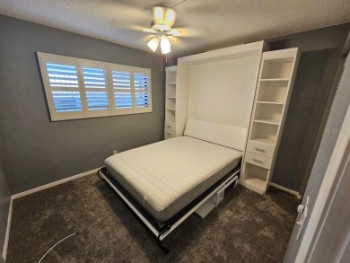** REDUCED PRICE ** Great water view from this 2nd floor villa on Isla Del Sol Yacht and Country Club in Florida - for sale on GolfHomes.com, golf home, golf lot