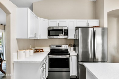 Spacious tri-level in the heart of Ahwatukee with 5 bedrooms, 3 on Ahwatukee Country Club in Arizona - for sale on GolfHomes.com, golf home, golf lot