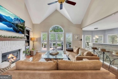 Perfectly positioned on the fairway of the par-5 2nd hole in the on Towne Lake Hills Golf Club in Georgia - for sale on GolfHomes.com, golf home, golf lot