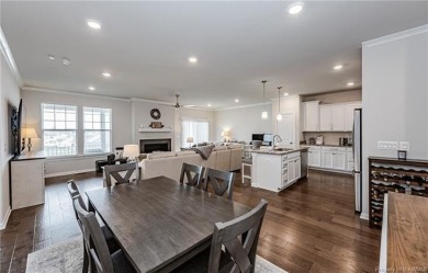 As you step inside, notice the LVP flooring  recessed lighting on Colonial Heritage Golf Club in Virginia - for sale on GolfHomes.com, golf home, golf lot