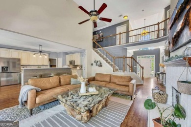 Perfectly positioned on the fairway of the par-5 2nd hole in the on Towne Lake Hills Golf Club in Georgia - for sale on GolfHomes.com, golf home, golf lot