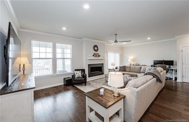 As you step inside, notice the LVP flooring  recessed lighting on Colonial Heritage Golf Club in Virginia - for sale on GolfHomes.com, golf home, golf lot
