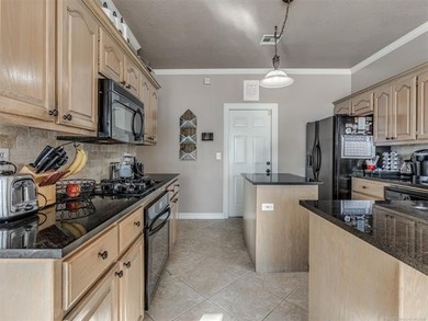 Beautiful 4 bedroom, 3.5 bath, 2.5 story home located on the 9th on Bailey Ranch Golf Club in Oklahoma - for sale on GolfHomes.com, golf home, golf lot