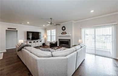 As you step inside, notice the LVP flooring  recessed lighting on Colonial Heritage Golf Club in Virginia - for sale on GolfHomes.com, golf home, golf lot