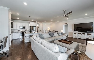 As you step inside, notice the LVP flooring  recessed lighting on Colonial Heritage Golf Club in Virginia - for sale on GolfHomes.com, golf home, golf lot