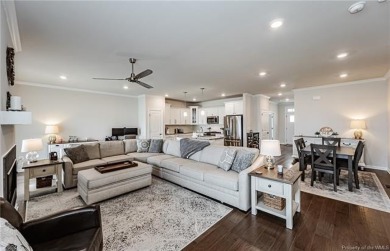 As you step inside, notice the LVP flooring  recessed lighting on Colonial Heritage Golf Club in Virginia - for sale on GolfHomes.com, golf home, golf lot