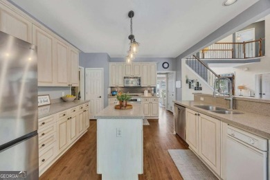 Perfectly positioned on the fairway of the par-5 2nd hole in the on Towne Lake Hills Golf Club in Georgia - for sale on GolfHomes.com, golf home, golf lot