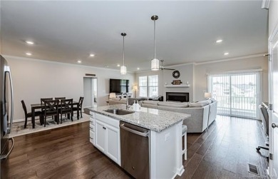As you step inside, notice the LVP flooring  recessed lighting on Colonial Heritage Golf Club in Virginia - for sale on GolfHomes.com, golf home, golf lot