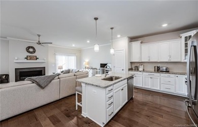 As you step inside, notice the LVP flooring  recessed lighting on Colonial Heritage Golf Club in Virginia - for sale on GolfHomes.com, golf home, golf lot