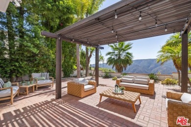 Perched at the top of the exclusive Mountaingate community of on Mountain Gate Country Club in California - for sale on GolfHomes.com, golf home, golf lot