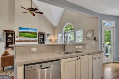 Perfectly positioned on the fairway of the par-5 2nd hole in the on Towne Lake Hills Golf Club in Georgia - for sale on GolfHomes.com, golf home, golf lot