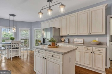 Perfectly positioned on the fairway of the par-5 2nd hole in the on Towne Lake Hills Golf Club in Georgia - for sale on GolfHomes.com, golf home, golf lot