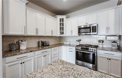 As you step inside, notice the LVP flooring  recessed lighting on Colonial Heritage Golf Club in Virginia - for sale on GolfHomes.com, golf home, golf lot