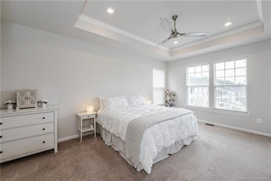 As you step inside, notice the LVP flooring  recessed lighting on Colonial Heritage Golf Club in Virginia - for sale on GolfHomes.com, golf home, golf lot