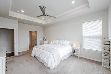 As you step inside, notice the LVP flooring  recessed lighting on Colonial Heritage Golf Club in Virginia - for sale on GolfHomes.com, golf home, golf lot