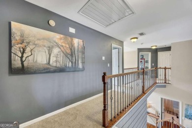 Perfectly positioned on the fairway of the par-5 2nd hole in the on Towne Lake Hills Golf Club in Georgia - for sale on GolfHomes.com, golf home, golf lot