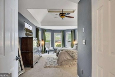 Perfectly positioned on the fairway of the par-5 2nd hole in the on Towne Lake Hills Golf Club in Georgia - for sale on GolfHomes.com, golf home, golf lot