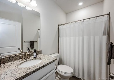 As you step inside, notice the LVP flooring  recessed lighting on Colonial Heritage Golf Club in Virginia - for sale on GolfHomes.com, golf home, golf lot