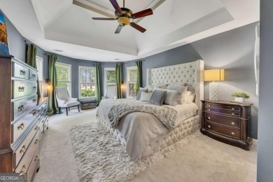 Perfectly positioned on the fairway of the par-5 2nd hole in the on Towne Lake Hills Golf Club in Georgia - for sale on GolfHomes.com, golf home, golf lot