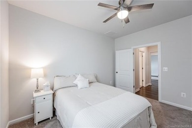 As you step inside, notice the LVP flooring  recessed lighting on Colonial Heritage Golf Club in Virginia - for sale on GolfHomes.com, golf home, golf lot