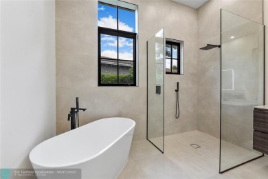 Truly one-of-a-kind home in prestigious Parkland Golf  Country on Parkland Golf Club in Florida - for sale on GolfHomes.com, golf home, golf lot