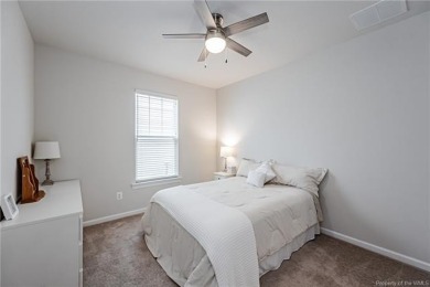As you step inside, notice the LVP flooring  recessed lighting on Colonial Heritage Golf Club in Virginia - for sale on GolfHomes.com, golf home, golf lot