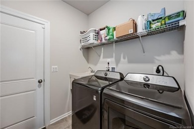 As you step inside, notice the LVP flooring  recessed lighting on Colonial Heritage Golf Club in Virginia - for sale on GolfHomes.com, golf home, golf lot