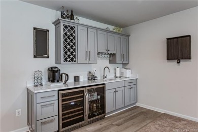 As you step inside, notice the LVP flooring  recessed lighting on Colonial Heritage Golf Club in Virginia - for sale on GolfHomes.com, golf home, golf lot