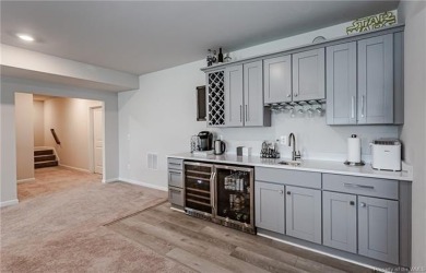 As you step inside, notice the LVP flooring  recessed lighting on Colonial Heritage Golf Club in Virginia - for sale on GolfHomes.com, golf home, golf lot