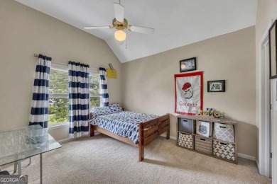 Perfectly positioned on the fairway of the par-5 2nd hole in the on Towne Lake Hills Golf Club in Georgia - for sale on GolfHomes.com, golf home, golf lot