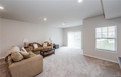 As you step inside, notice the LVP flooring  recessed lighting on Colonial Heritage Golf Club in Virginia - for sale on GolfHomes.com, golf home, golf lot