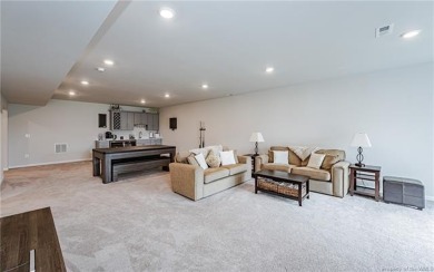 As you step inside, notice the LVP flooring  recessed lighting on Colonial Heritage Golf Club in Virginia - for sale on GolfHomes.com, golf home, golf lot