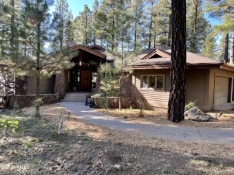 This beautiful and bright 3 bedroom, 3 bath home boasts on Forest Highlands Golf Club - The Canyon in Arizona - for sale on GolfHomes.com, golf home, golf lot