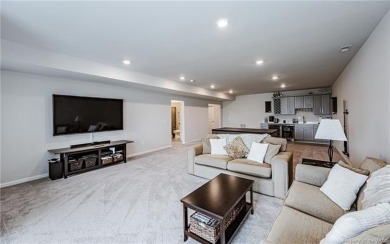 As you step inside, notice the LVP flooring  recessed lighting on Colonial Heritage Golf Club in Virginia - for sale on GolfHomes.com, golf home, golf lot